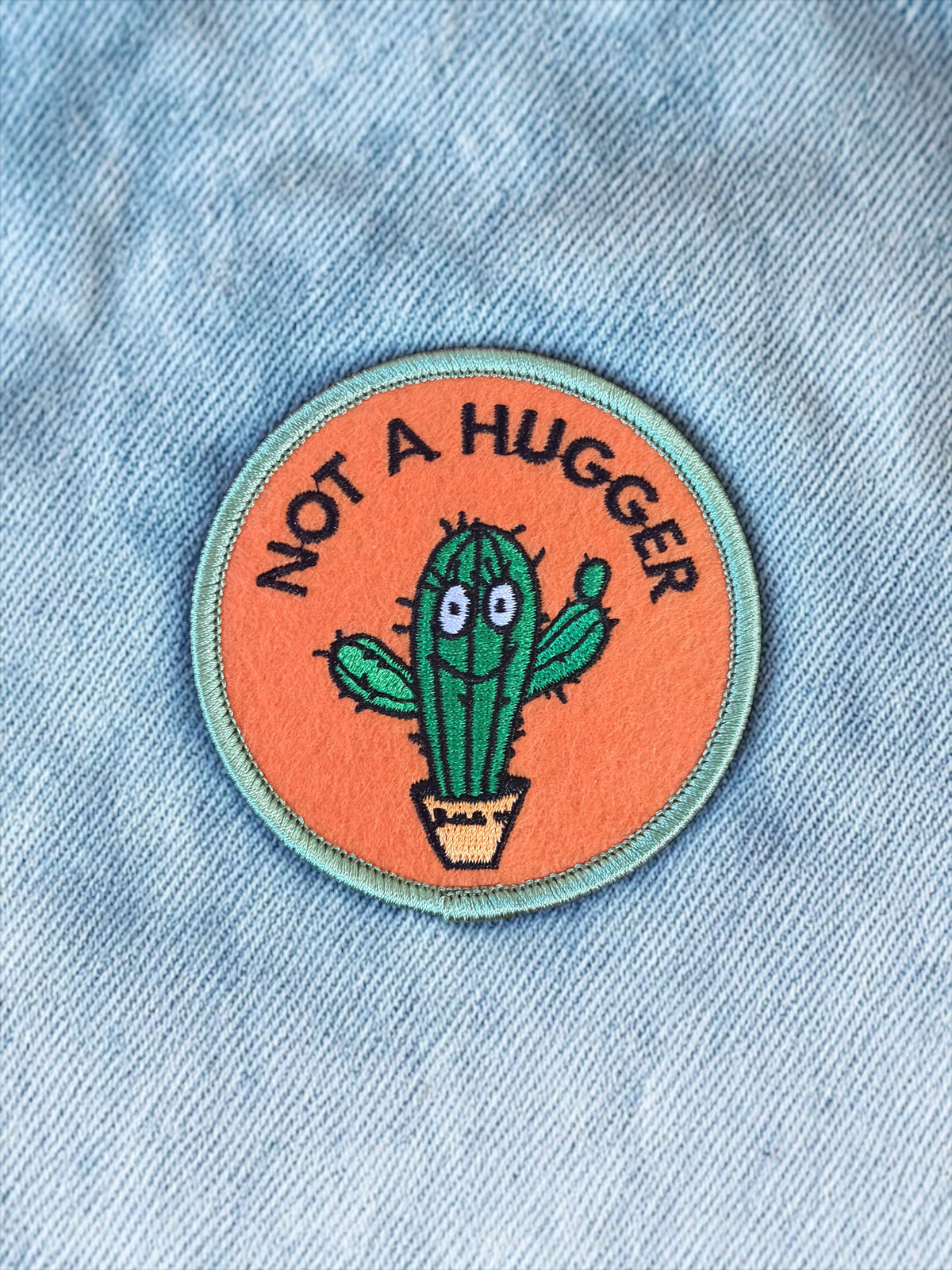 Not a hugger… Iron on patch.