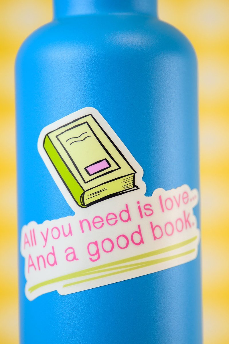 All you need is love... and a good book. Vinyl Sticker. - M E R I W E T H E R